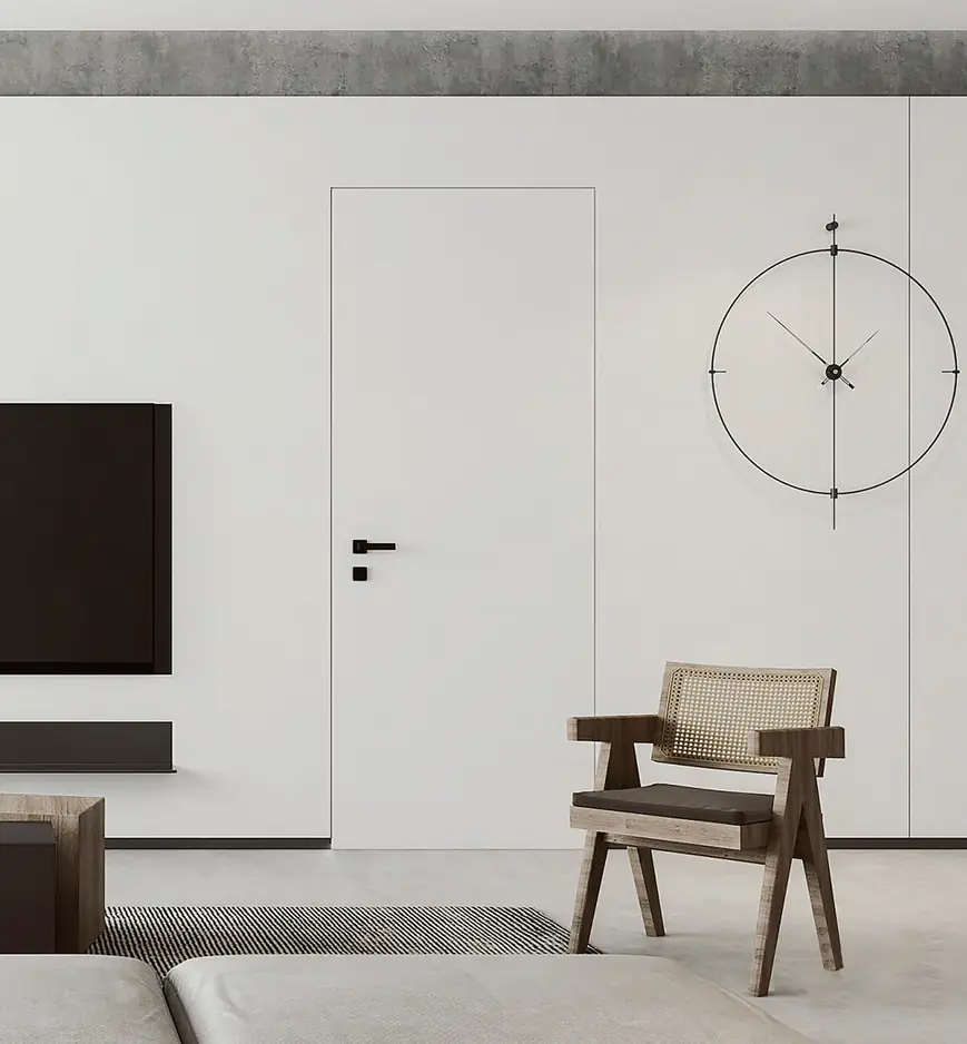 A living room with a white concealed (flush) door